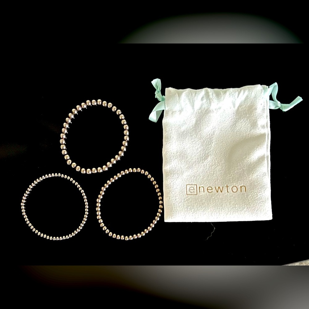 enewton bracelets, 3 sizes, silver, worn minimally, comes with pouch